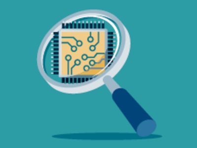 Computer chip in a magnifying glass